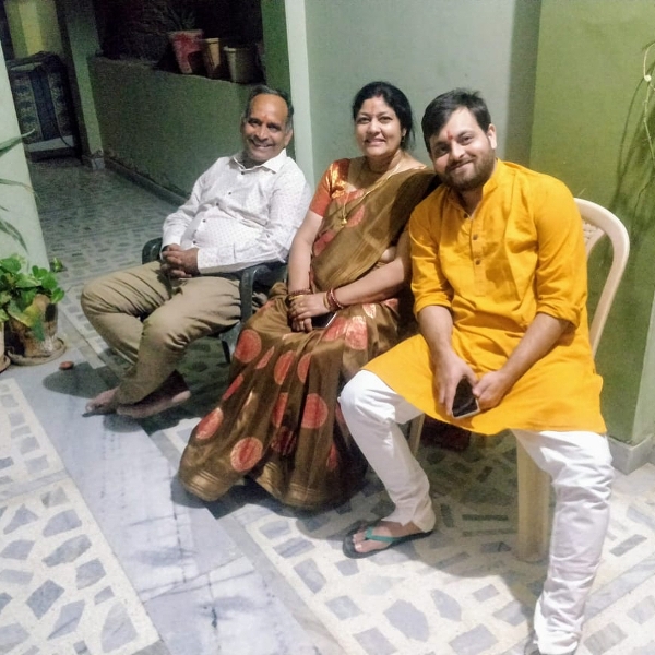 Devesh Dixit with his parents