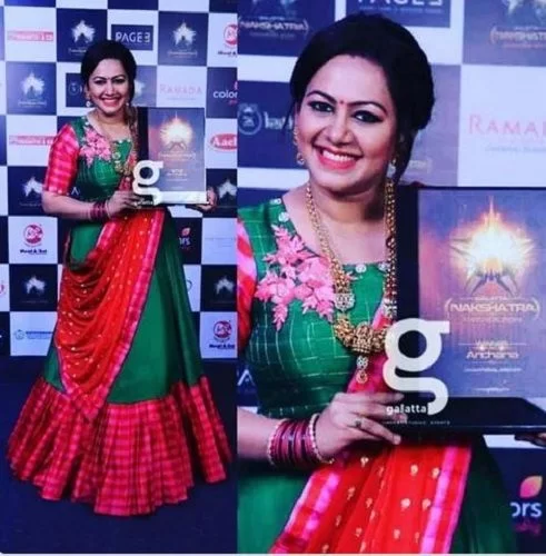 Archana Chandhoke Holding Her Award