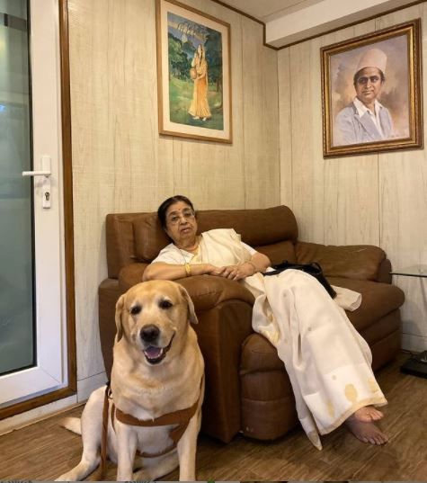 Usha Mangeshkar with her pet dog Bittu