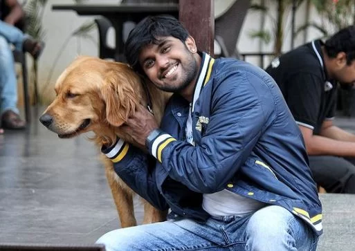 Shamanth Gowda with a dog
