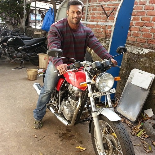 Jagdish Lad sitting on hi motorcycle