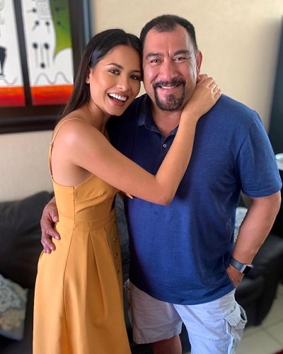 Andrea Meza with her father