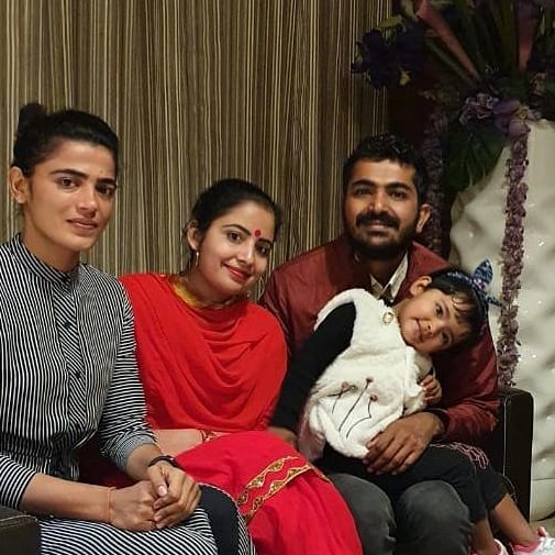 Savita Punia with her brother and sister-in-law