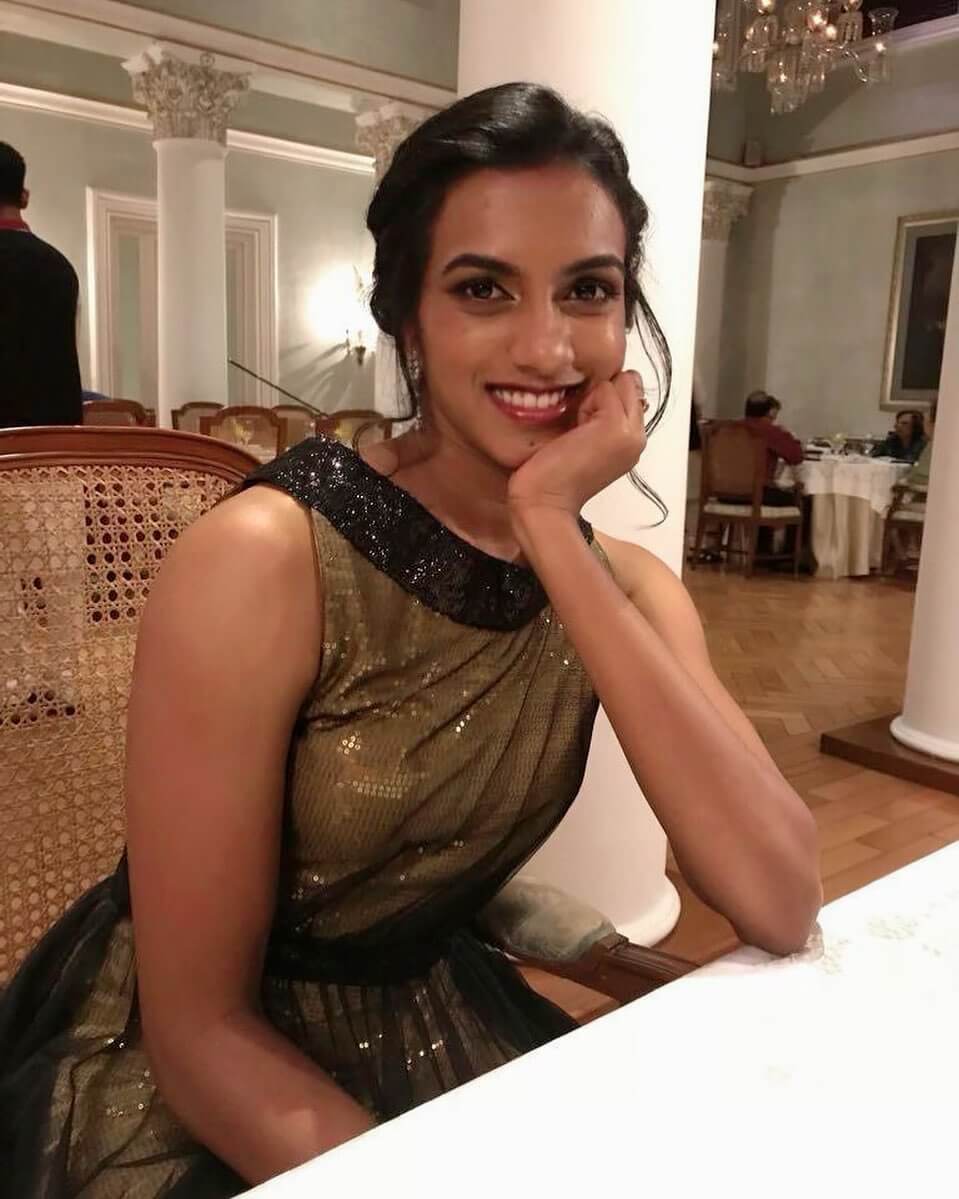 PV Sindhu in golden dress