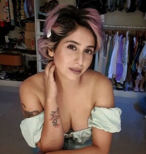 Neha Bhasin hot cleavage pop out